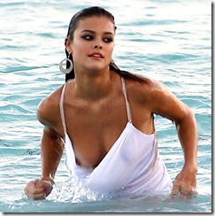 51260270 Victoria's Secret model Nina Agdal is spotted doing a photo shoot on the beach in Miami, Florida on November 12, 2013. During one of the shots, Nina suffers a wardrobe malfunction while coming out of the water! FameFlynet, Inc - Beverly Hills, CA, USA - +1 (818) 307-4813